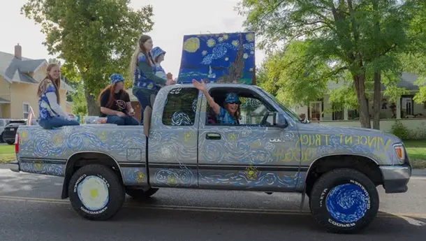 Truck painted in the style of Vincent van Gogh for a Homecoming parade